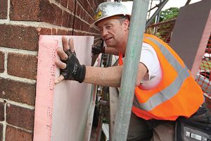 Generic worker installing insulation